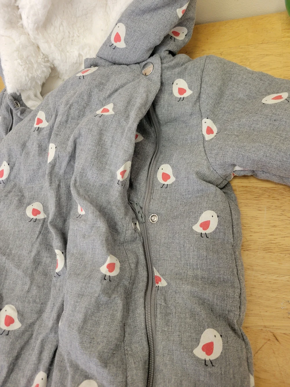 Gray Jacadi Paris infant snowsuit featuring a red and white bird pattern 12m